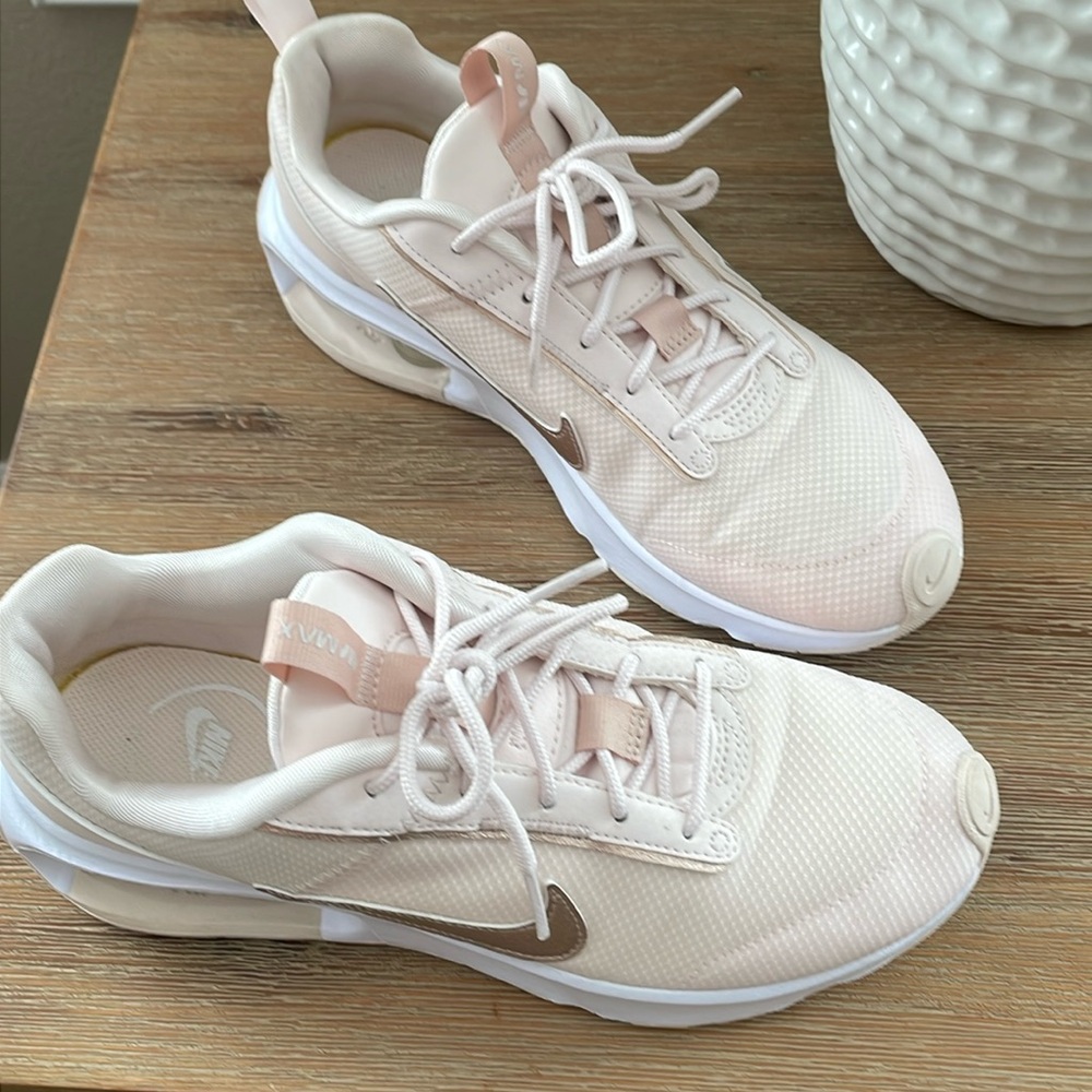 Light pink Nike Air size 8